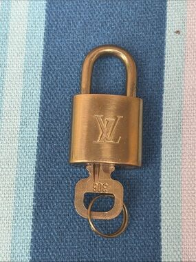 Louis Vuitton Gold Tone LV Padlock with Key